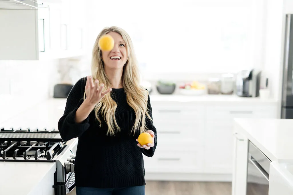 Registered dietitian enjoying fresh fruit — food-positive, weight-inclusive care