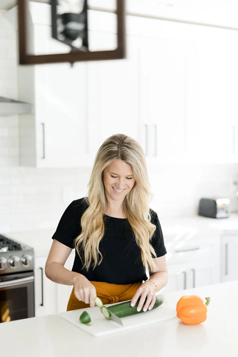 Dietitian preparing fresh vegetables — condition-focused nutrition care